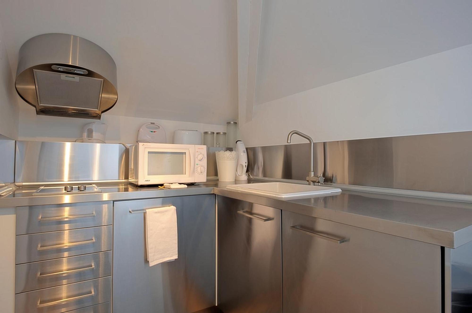 Portas Do Castelo Apartments Лиссабон Номер фото